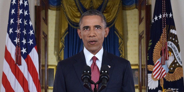 WASHINGTON, DC - SEPTEMBER 10: U.S. President Barack Obama delivers a prime time address from the Cross Hall of the White House on September 10, 2014 in Washington, DC. Vowing to target the Islamic State with air strikes 'wherever they exist', Obama pledged to lead a broad coalition to fight IS and work with 'partner forces' on the ground in Syria and Iraq. (Photo by Saul Loeb-Pool/Getty Images)