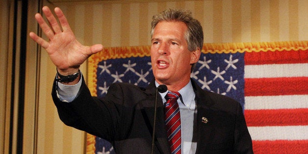 Scott Brown, a former U.S. Senator from Massachusetts, speaks to supporters after winning New Hampshire's Republican U.S. Senate primary on Tuesday Sept. 9, 2014 in Concord, N.H. Brown will face incumbent Democrat Jeanne Shaheen in the general election in November. (AP Photo/Jim Cole)