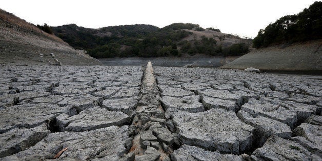 SAN JOSE, CA - JANUARY 28: A pipe emerges from dried and cracked earth that used to be the bottom of the Almaden Reservoir on January 28, 2014 in San Jose, California. Now in its third straight year of drought conditions, California is experiencing its driest year on record, dating back 119 years, and reservoirs throughout the state have low water levels. Santa Clara County reservoirs are at 3 percent of capacity or lower. California Gov. Jerry Brown officially declared a drought emergency to speed up assistance to local governments, streamline water transfers and potentially ease environmental protection requirements for dam releases. (Photo by Justin Sullivan/Getty Images)