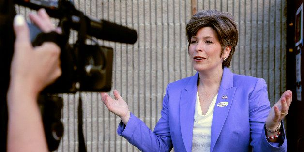 Republican U.S. Senate candidate Joni Ernst talks to a television reporter after casting her vote in Iowaâs Republican primary in Red Oak, Iowa, Tuesday, June 3, 2014. Five Republicans are competing for the GOP Senate nomination and a chance to face Democrat Bruce Braley, who is running unopposed. (AP Photo/Nati Harnik)