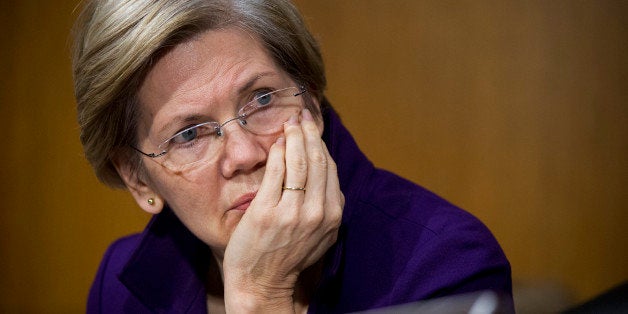 UNITED STATES - NOVEMBER 14: Sen. Elizabeth Warren, D-Mass., attends a Senate Banking Urban Affairs Committee hearing in Dirksen Building on Janet Yellen's confirmation to head the Federal Reserve. (Photo By Tom Williams/CQ Roll Call)