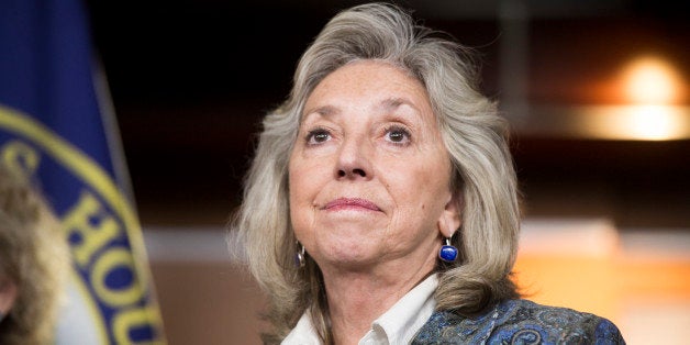 UNITED STATES - APRIL 8: Rep. Dina Titus, D-Nev., participates in the House Democratic women news conference to mark 'Equal Pay Day' on Tuesday, April 8, 2014. The lei was made out of Pay Day candy bars strung together. (Photo By Bill Clark/CQ Roll Call)