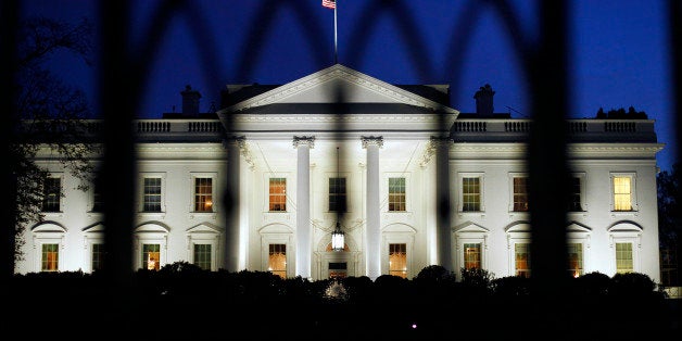 The White House as seen at night on Monday, Nov., 14, 2011 in Washington. The six Democrats and six Republicans have until next Wednesday to come together on a plan to save $1.2 trillion through spending cuts or tax increases. Despite some progress, there's still no deal.(AP Photo/Pablo Martinez Monsivais)