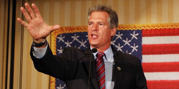 Scott Brown, a former U.S. Senator from Massachusetts, speaks to supporters after winning New Hampshire's Republican U.S. Senate primary on Tuesday Sept. 9, 2014 in Concord, N.H. Brown will face incumbent Democrat Jeanne Shaheen in the general election in November. (AP Photo/Jim Cole)