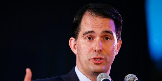 FILE - In this Aug. 8, 2014, file photo, Wisconsin Gov. Scott Walker addresses the Republican National Committee summer meetings in Chicago. Prosecutors investigating Gov. Scott Walker's recall campaign and more than two dozen conservative groups hope to convince a federal appeals court to overturn a judge's ruling that temporarily blocked the probe. (AP Photo/Kamil Krzaczynski, File)