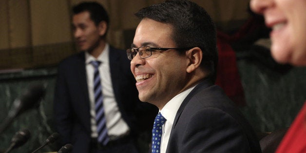 WASHINGTON, DC - JANUARY 08: Senior counsel to the U.S. Senate Judiciary Committee Debo Adegbile testifies...