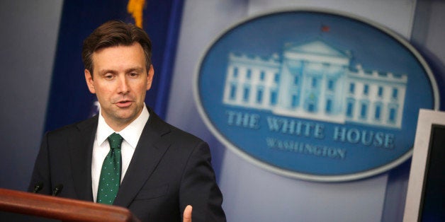 White House press secretary Josh Earnest speaks to reporters during the daily press briefing at the White House in Washington, Friday, Sept. 12, 2014. Earnest took questions about Islamic State militants. (AP Photo/Evan Vucci)