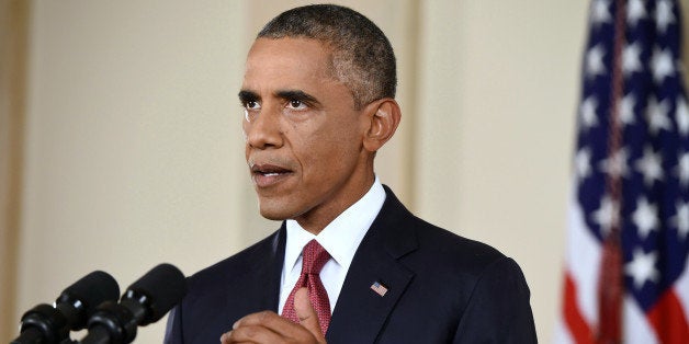 President Barack Obama addresses the nation from the Cross Hall in the White House in Washington, Wednesday, Sept. 10, 2014. In a major reversal, Obama ordered the United States into a broad military campaign to âdegrade and ultimately destroyâ militants in two volatile Middle East nations, authorizing airstrikes inside Syria for the first time, as well as an expansion of strikes in Iraq. (AP Photo/Saul Loeb, Pool)