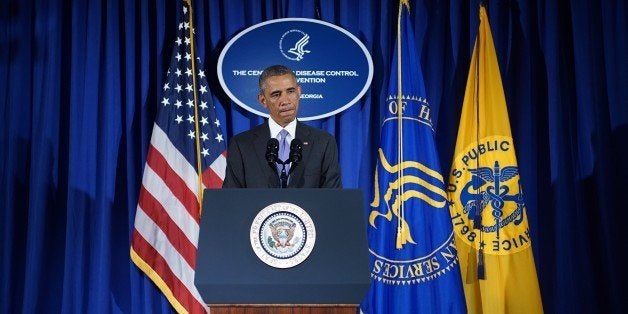 US President Barack Obama makes a statement following meetings at the Centers for Disease Control and Prevention on September 16, 2014 in Atlanta, Georgia. Obama on Tuesday called on the world to 'act fast' to stop West Africa's Ebola epidemic before 'hundreds of thousands' are infected. Obama urged a global expanded effort to fight the deadly disease, as he unveiled a major new US initiative which will see 3,000 military personnel posted to West Africa to combat the health crisis.AFP PHOTO/Mandel NGAN (Photo credit should read MANDEL NGAN/AFP/Getty Images)