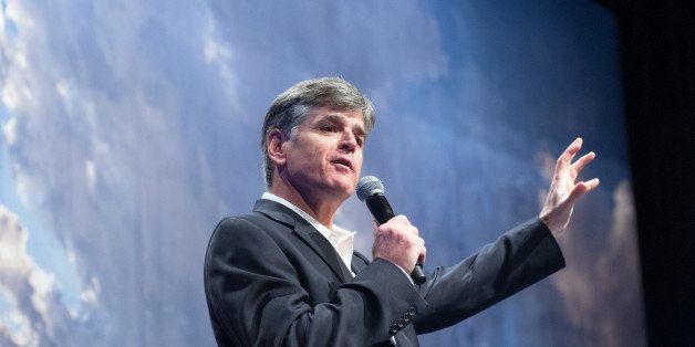 Political commentator Sean Hannity addresses the crowd while delivering his speech, "Get America Back to Work", Thursday, May 22, 2014, during the 22nd Williston Basin Petroleum Conference held in Bismarck, N.D. (AP Photo/Kevin Cederstrom)