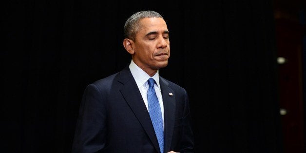 US President Barack Obama pauses as he makes a statement to the press on April 2, 2014 in Chicago, Illinois, on the shooting at the Fort Hood military base in Texas. One person was killed and 14 others wounded April 2, 2014 in a shooting incident at Fort Hood, a US official said. AFP PHOTO / Jewel Samad (Photo credit should read JEWEL SAMAD/AFP/Getty Images)