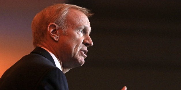 FILE - In this Aug. 28, 2014 file photo, Illinois Republican gubernatorial candidate Bruce Rauner answers questions during th