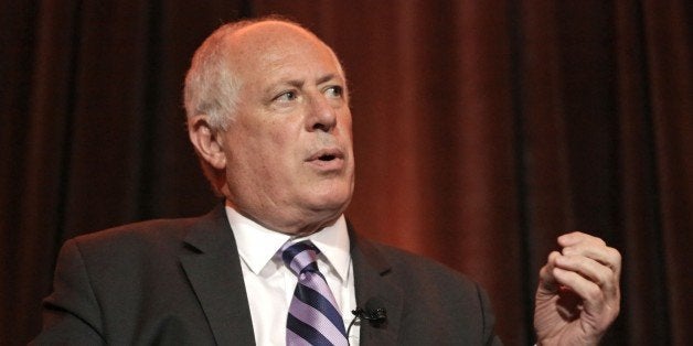 FILE - In this Aug. 28, 2014 file photo, Illinois Gov. Pat Quinn answers questions during the Metropolitan Planning Council's