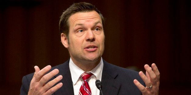 This April 22, 2013 file photo shows Kansas Secretary of State Kris Kobach testifying on Capitol Hill in Washington before the Senate Judiciary Committee hearing on immigration reform. Kobach's challenger in the Kansas Republican primary, Scott Morgan, is demanding that Kobach fully disclose his earnings from outside work by releasing his income tax records for the past three years. Morgan said Tuesday, June 17, 2014, that voters deserve to know the extent of Kobach's private financial dealings with other parties. (AP Photo/Jacquelyn Martin, File)