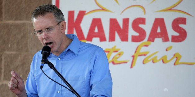 Democratic gubernatorial candidate Paul Davis answers questions during a debate with incumbent Republican Gov. Sam Brownback at the Kansas State Fair Saturday, Sept. 6, 2014, in Hutchinson, Kan. (AP Photo/Charlie Riedel)
