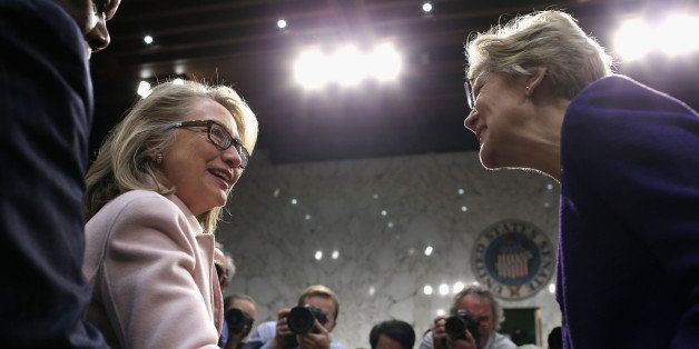 WASHINGTON, DC - JANUARY 24: U.S. Secretary of State Hillary Clinton (L) greets Sen. Elizabeth Warren (D-MA) as they arrive for Sen. John Kerry's (D-MA) confirmation hearing before the Senate Foreign Relations Committee to become the next Secretary of State in the Hart Senate Office Building on Capitol Hill January 24, 2013 in Washington, DC. Nominated by President Barack Obama to succeed Hillary Clinton as Secretary of State, Kerry has served on this committee for 28 years and has been chairman for four of those years. (Photo by Chip Somodevilla/Getty Images)