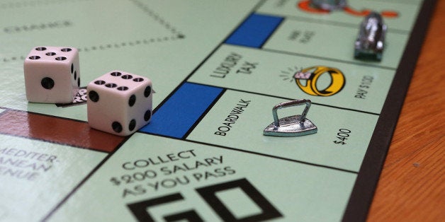 FAIRFAX, CA - FEBRUARY 06: In this photo illustration, The Monopoly iron game piece is displayed on February 6, 2013 in Fair