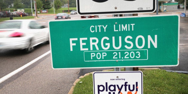 FERGUSON, MO - SEPTEMBER 10: A sign welcomes visitors to the city on September 10, 2014 in Ferguson,...