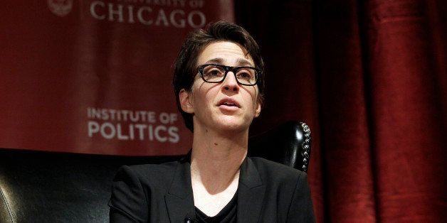 Rachel Maddow, host of "The Rachel Maddow Show" on MSNBC, shares a stage with pundits during a panel discussion, "2012: The Path to the Presidency", at the University of Chicago in Chicago on Thursday, Jan. 19, 2012. (AP Photo/Nam Y. Huh)