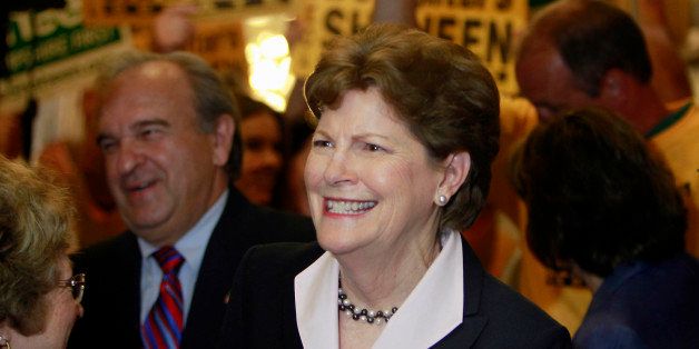 FILE - In this June 9, 2014 file photo, Sen. Jeanne Shaheen D-N.H. is surrounded by supporters in Concord, N.H. to file her campaign paperwork to seek re-election. Shaheen is wasting no time contrasting Republican Scott Brown's recent arrival in New Hampshire to her deep connections and decades of service. (AP Photo/Jim Cole, File)