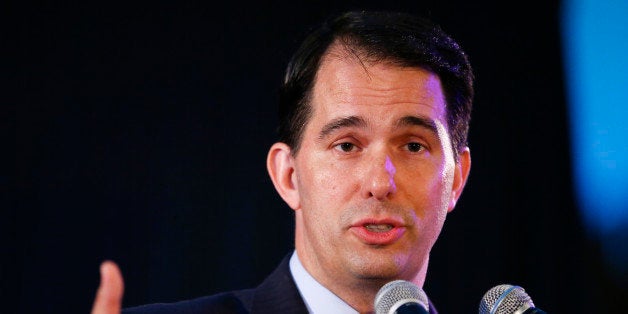 FILE - In this Aug. 8, 2014, file photo, Wisconsin Gov. Scott Walker addresses the Republican National Committee summer meetings in Chicago. Prosecutors investigating Gov. Scott Walker's recall campaign and more than two dozen conservative groups hope to convince a federal appeals court to overturn a judge's ruling that temporarily blocked the probe. (AP Photo/Kamil Krzaczynski, File)