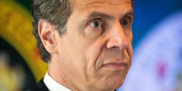 NEW YORK, NY - SEPTEMBER 24: New Jersey Governor Andrew Cuomo stands during a press conference with New Jersey Gov. Chris Ch