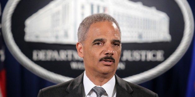 WASHINGTON, DC - AUGUST 21: Attorney General Eric Holder makes a major financial fraud announcement during a press conference August 21, 2014 at the Justice Department in Washington, DC. The Justice Department has reached a $16.65 billion settlement with Bank of America Corporation for financial fraud leading up to and during the financial crisis, the largest civil settlement with a single entity in American history, to resolve federal and state claims against Bank of America and its former and current subsidiaries, including Countrywide Financial Corporation and Merrill Lynch. (Photo by Alex Wong/Getty Images)