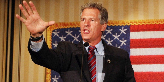 Scott Brown, a former U.S. Senator from Massachusetts, speaks to supporters after winning New Hampshire's Republican U.S. Senate primary on Tuesday Sept. 9, 2014 in Concord, N.H. Brown will face incumbent Democrat Jeanne Shaheen in the general election in November. (AP Photo/Jim Cole)