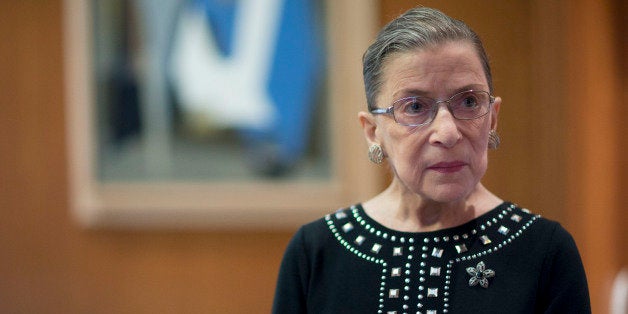 Ruth Bader Ginsburg, associate justice of the U.S. Supreme Court, stands in her chambers following an interview in Washington, D.C., U.S., on Friday, Aug. 23, 2013. Ginsburg, 80, the oldest member of the Supreme Court and appointed to the court in 1993 by Democratic President Bill Clinton, has said on several occasions that she wants to match the longevity of Justice Louis Brandeis, who was 82 when he stepped down in 1939. Photographer: Andrew Harrer/Bloomberg via Getty Images 