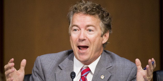 UNITED STATES - SEPTEMBER 17: Sen. Rand Paul, R-Ky., questions Secretary of State John Kerry testifies during the Senate Foreign Relations Committee hearing on 'United States Strategy to Defeat the Islamic State in Iraq and the Levant' on Wednesday, Sept. 17, 2014. (Photo By Bill Clark/CQ Roll Call)