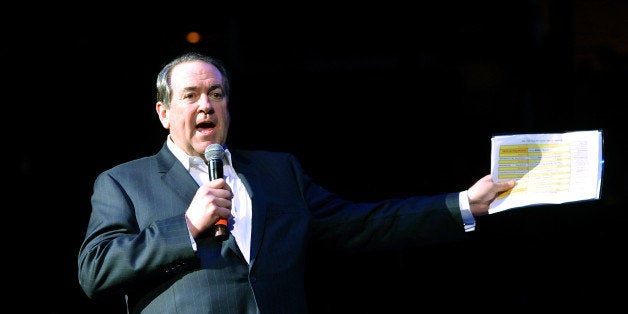 NASHVILLE, TN - NOVEMBER 22: (Exclusive Coverage) Mike Huckabee hosts Playin' Possum! The Final No Show Tribute To George Jones - Show at Bridgestone Arena on November 22, 2013 in Nashville, Tennessee. (Photo by Larry Busacca/NJ/Getty Images for Webster PR)