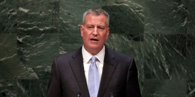 FILE- In this Sept. 23, 2014 file photo, New York Mayor Bill de Blasio addresses the Climate Change Summit, at United Nations headquarters. Within days de Blasio has made a speech in front of the United Nations, has a prime speaking slot at a political conference in England and walked next to Al Gore in a massive climate march. Those big stages are becoming the norm for de Blasio, who has conspicuously been trying to raise his profile nationally and internationally. (AP Photo/Richard Drew, File)