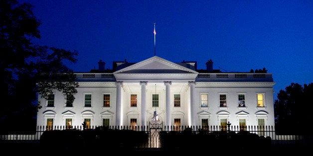 Dusk fades over the White House the night before the 2012 election, on Monday, Nov. 5, 2012, as seen from Pennsylvania Avenue in Washington. (AP Photo/Jacquelyn Martin)