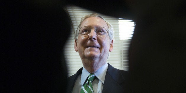 Senate Minority Leader Mitch McConnell, a Republican from Kentucky, waits to start a news conference at the U.S. Capitol Building in Washington, D.C., U.S., on Thursday, Sept. 19, 2014. President Barack Obama's plan to arm and train Syrian rebels is poised to pass the U.S. Senate today with broad support though few predict such bipartisan spirit when Congress returns to work after the Nov. 4 election. Photographer: Andrew Harrer/Bloomberg via Getty Images 