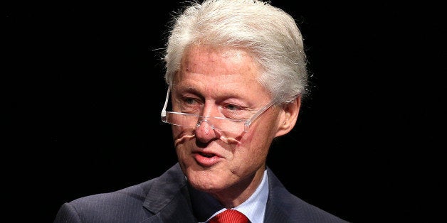 MELBOURNE, AUSTRALIA - JULY 23: Former U.S. President Bill Clinton addresses the 20th International AIDS Conference at The Melbourne Convention and Exhibition Centre on July 23, 2014 in Melbourne, Australia. Several researchers, activists and health workers due to attend the conference were killed enroute in the Malaysian Airlines plane MH17 shot down over Eastern Ukraine. (Photo by Graham Denholm/Getty Images)