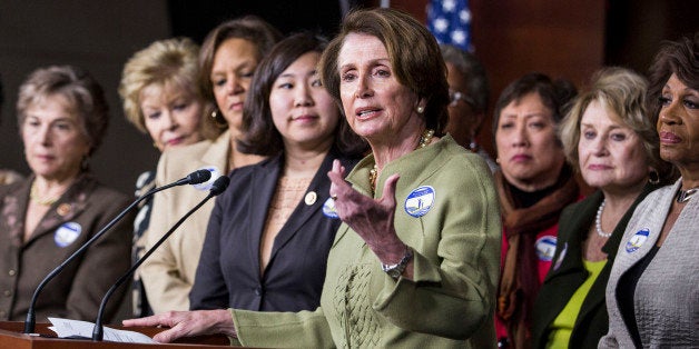 WASHINGTON, DC - APRIL 8: House Minority Leader Nancy Pelosi (D-CA) (4th R) speaks during a news conference to mark Equal Pay Day, on Capitol Hill, April 8, 2014 in Washington, DC. Pelosi and her fellow House Democrats urged Republican House members to pass the Paycheck Fairness Act. (Drew Angerer/Getty Images)