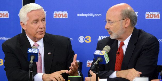 Republican Gov. Tom Corbett, left, and Democratic challenger Tom Wolf take part in a debate at "Breakfast with the Candidates" event at KYW-TV and KYW-AM on Wednesday, Oct. 1, 2014 in Philadelphia. The second debate between the two became tense as Wolf sought to assign blame to Corbett for budget deficits and struggling schools while Corbett tried to frame Wolf as the candidate who will favor labor unions over taxpayers. (AP Photo/The Philadelphia Inquirer, Tom Gralish, Pool)