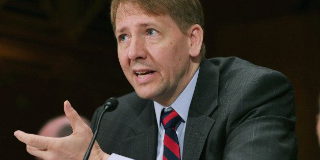 WASHINGTON, DC - JUNE 10: Consumer Financial Protection Bureau Director Richard Cordray testifies before the Senate Banking, Housing and Urban Affairs Committee in the Dirksen Senate Office Building on Capitol Hill June 10, 2014 in Washington, DC. Cordray was delivering the CFPB semi-annual report. (Photo by Chip Somodevilla/Getty Images)