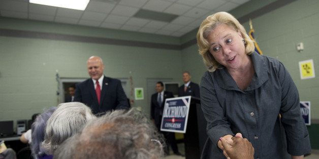 UNITED STATES - SEPTEMBER 22: From right, Sen. Mary Landrieu, D-La., New Orleans Mayor Mitch Landrieu and Rep. Cedric Richmond, D-La., make their way into the Pontchartrain Park Community Center in New Orleans to speak to seniors on Monday, Sept. 22, 2014. Sen. Landrieu and her brother New Orleans Mayor Mitch Landrieu endorsed Rep. Richmond during the event. (Photo By Bill Clark/CQ Roll Call)