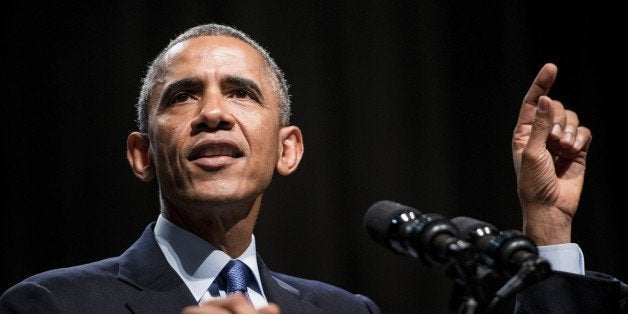 President Barack Obama speaks at Northwestern University October 2, 2014 in Evanston, Illinois. Obama spoke about the economy to a group at the Kellogg business school after attending a fundraiser at another location earlier in the day. AFP PHOTO/Brendan SMIALOWSKI (Photo credit should read BRENDAN SMIALOWSKI/AFP/Getty Images)