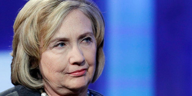 Former Secretary of State Hillary Rodham Clinton listens during a panel discussion at the Clinton Global Initiative, Monday, Sept. 22, 2014 in New York. (AP Photo/Mark Lennihan)