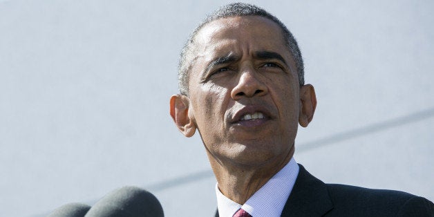 WASHINGTON, DC - OCTOBER 5: U.S. President Barack Obama speaks during a dedication ceremony for the American Veterans Disabled for Life Memorial on October 5, 2014 in Washington, DC. The memorial is dedicated to U.S. veterans severely injured in war. (Photo by Kristoffer Tripplaar-Pool/Getty Images)