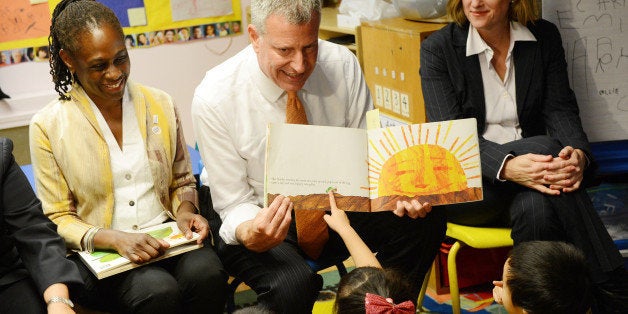 NEW YORK, NY - SEPTEMBER 4: New York Mayor Bill de Blasio, along with First Lady Chirlane McCray (L) and Queens Borough President Melinda Katz (R), visits Pre-K classes at Home Sweet Home Children's School in Queens on the first day of NYC public schools, September 4, 2014 in the Queens borough of New York City. New York Mayor Bill de Blasio is touring universal pre-kindergarten programs throughout the city. (Photo by Susan Watts-Pool/Getty Images)