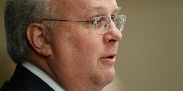 DALLAS, TX - APRIL 12: Karl Rove, former Deputy Chief of Staff and Senior Policy Advisor to U.S. President George W. Bush, prepares to lead a panel discussion at The 4% Project Conference on April 12, 2011 at Southern Methodist University in Dallas, Texas. The economic conference, sponsored by the George W. Bush Presidential Center, intends to increase awareness of public policies and private business strategies that increase opportunity and prosperity for Americans. (Photo by Tom Pennington/Getty Images)