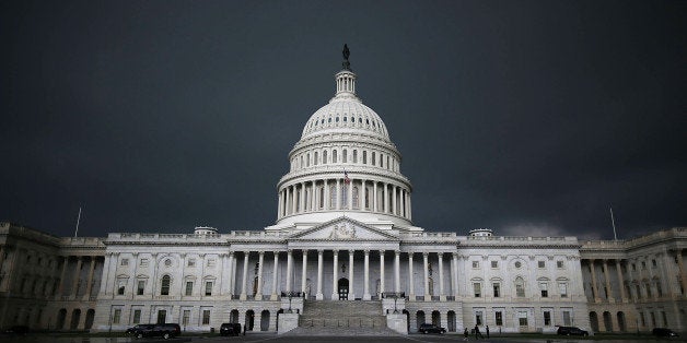 WASHINGTON, DC - JUNE 13: Storm clouds fill the sky over the U.S. Capitol Building, June 13, 2013 in Washington, DC. Potenti