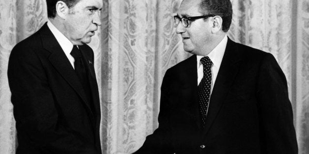 WASHINGTON - SEPTEMBER 1973: US president Richard Nixon (L) shakes hands with Henry Kissinger, foreign Secretary of State, September 1973 in Washington. (Photo by AFP/Getty Images)