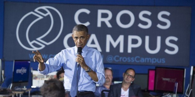 US President Barack Obama holds a town hall meeting at Cross Campus in Santa Monica, California, October 9, 2014. Cross Campus is a collaborative workspace that brings together freelancers, creative professional, entrepreneurs and other startups. AFP PHOTO / Saul LOEB (Photo credit should read SAUL LOEB/AFP/Getty Images)