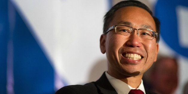 Rhode Island Republican gubernatorial nominee Allan Fung addresses supporters during a primary election night watch party Tuesday, Sept. 9, 2014, in Warwick, R.I. (AP Photo/Gretchen Ertl)