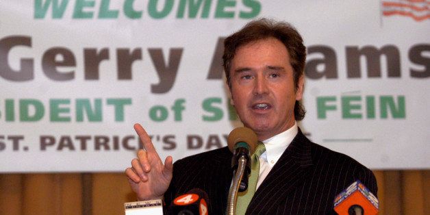 U.S. Rep. Brian Higgins, D-N.Y., explains the absence of Gerry Adams at the Buffalo Irish Center in Buffalo, N.Y., Friday, March 17, 2006. Adams, President of the Sinn Fein Party in Ireland, was detained in Washington, D.C., after his name appeared on a terrorist watch-list. (AP Photo/Don Heupel)