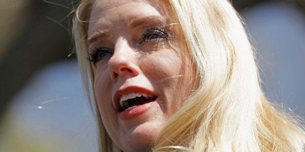 WASHINGTON, DC - MARCH 27: Florida Attorney General Pam Bondi speaks during a news conference about the Supreme Court's second day of hearings on the constitutionality of the Patient Protection and Affordable Care Act March 27, 2012 in Washington, DC. Bondi and 25 other attorneys general brought the case before the Supreme Court. Both Republicans and Democrats paid close attention to the questions and statements by Justice Anthony Kennedy during the court proceedings. (Photo by Chip Somodevilla/Getty Images)